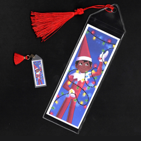 Brown-eyed boy Elf on the Shelf bookmark and mini bookmark with green tassels by L.C. Ireland, accordingtolc