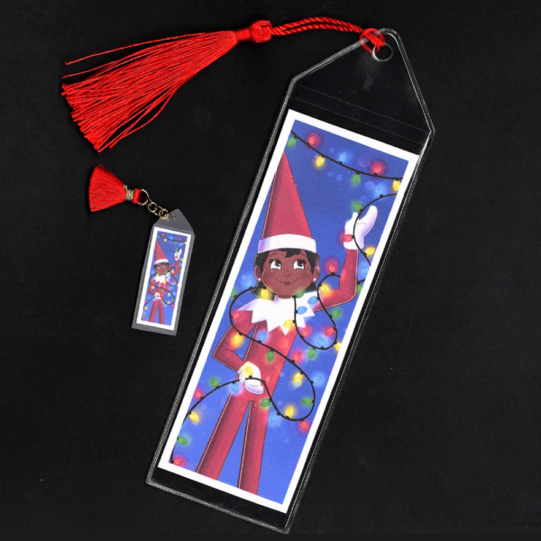 Brown-eyed girl Elf on the Shelf bookmark and mini bookmark with red tassels by L.C. Ireland, accordingtolc