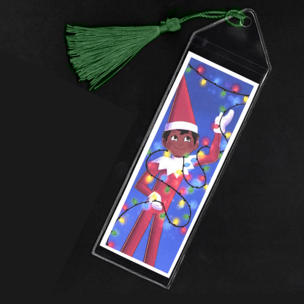 Brown-eyed boy Elf on the Shelf bookmark with green tassel by L.C. Ireland, accordingtolc