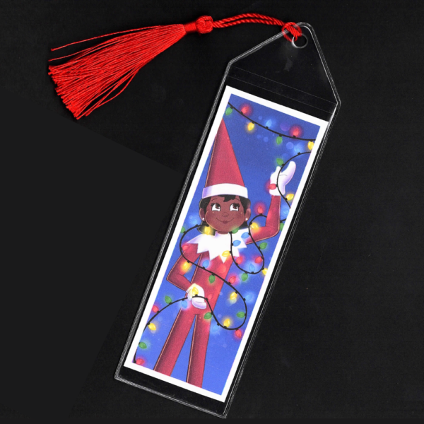 Brown-eyed girl Elf on the Shelf bookmark with red tassel by L.C. Ireland, accordingtolc